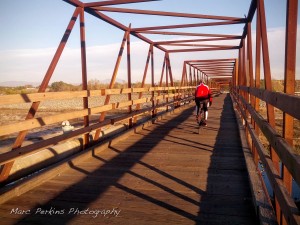 The bridge that connects the west and east side of the Santa Ana River Trail in Costa Mesa / Huntington Beach. North of this point SART runs primarily on the east side of the river; south of this point SART runs primarily on the west side of the river.