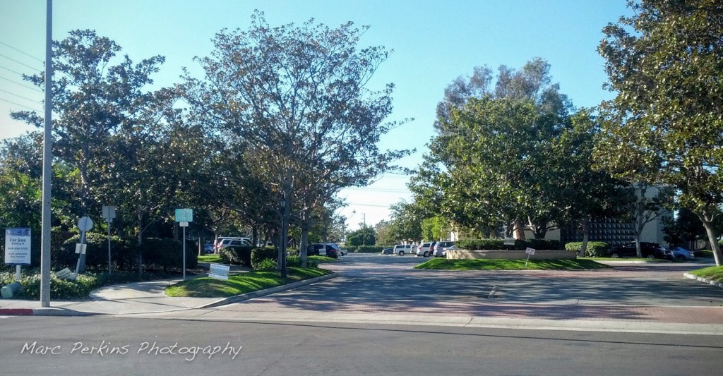 The entrance to the Santa Ana River Trail from Sunflower Ave / Cadillac Ave is nearly impossible to see unless you know right where it is. It's to the left of the large driveway in this image.