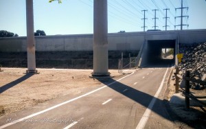 The Sunflower Ave entrance to the Santa Ana River Trail is just north of the 405 bridge. It's easy to miss!