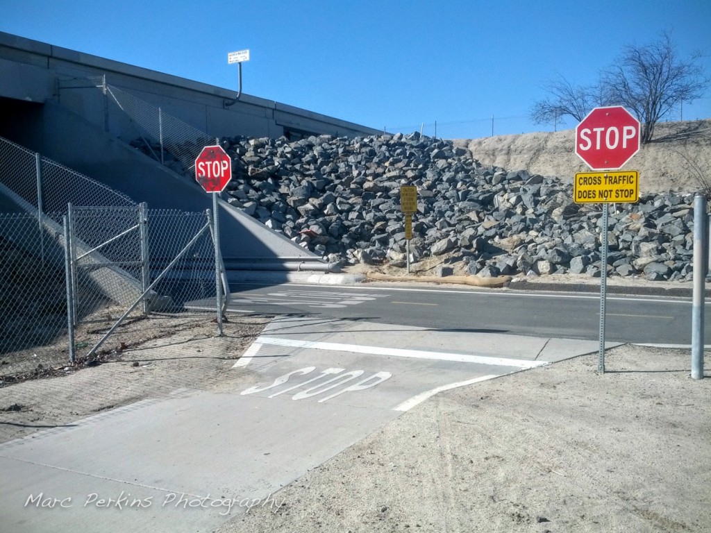 The Sunflower Ave. entrance to the Santa Ana River Trail. Bicyclists fly down the hill and through the tunnel, so do indeed stop and look both ways before entering the trail!