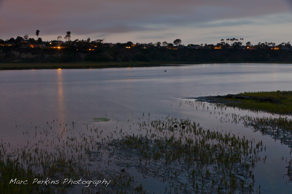 Taken well after sunset, this long exposure shot of the western bluffs as clouds roll in at Newport Back Bay (in Newport Beach, CA) has an etherial glow to it. I love how the house lights on the bluffs add dimension and light to the otherwise natural region.