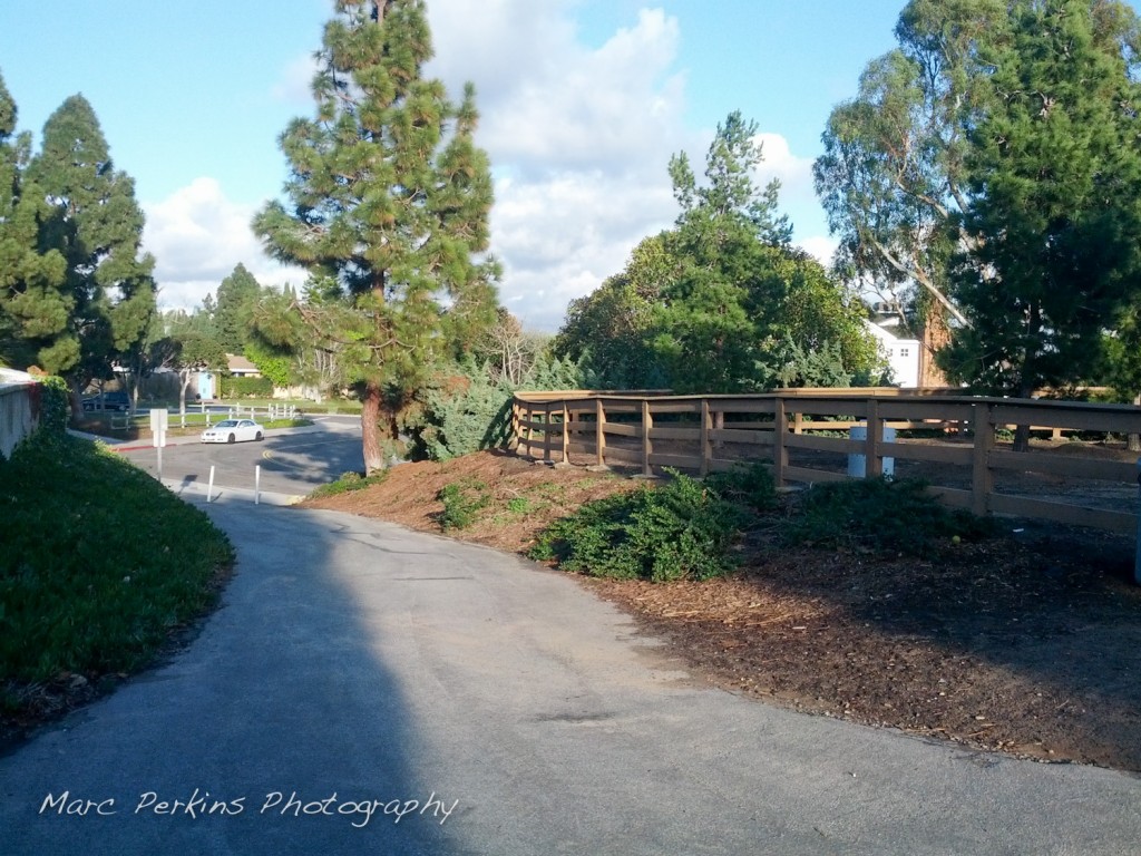 The exit from the clifftop bike trail to Santiago Drive.