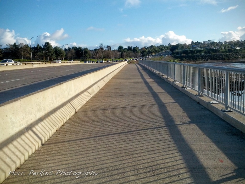 The protected pedestrian and bicycle lane on the Jamboree bridge over San Diego Creek.