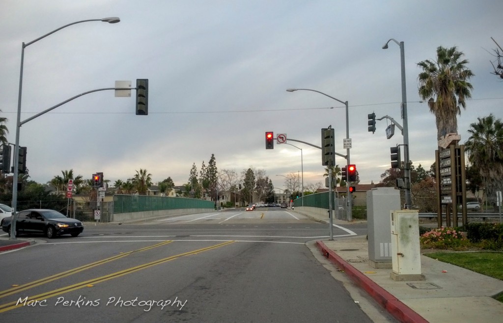 My preferred point to cross the 55 freeway / Newport Drive in this area of Costa Mesa is at Vanguard Way / Santa Isabel.