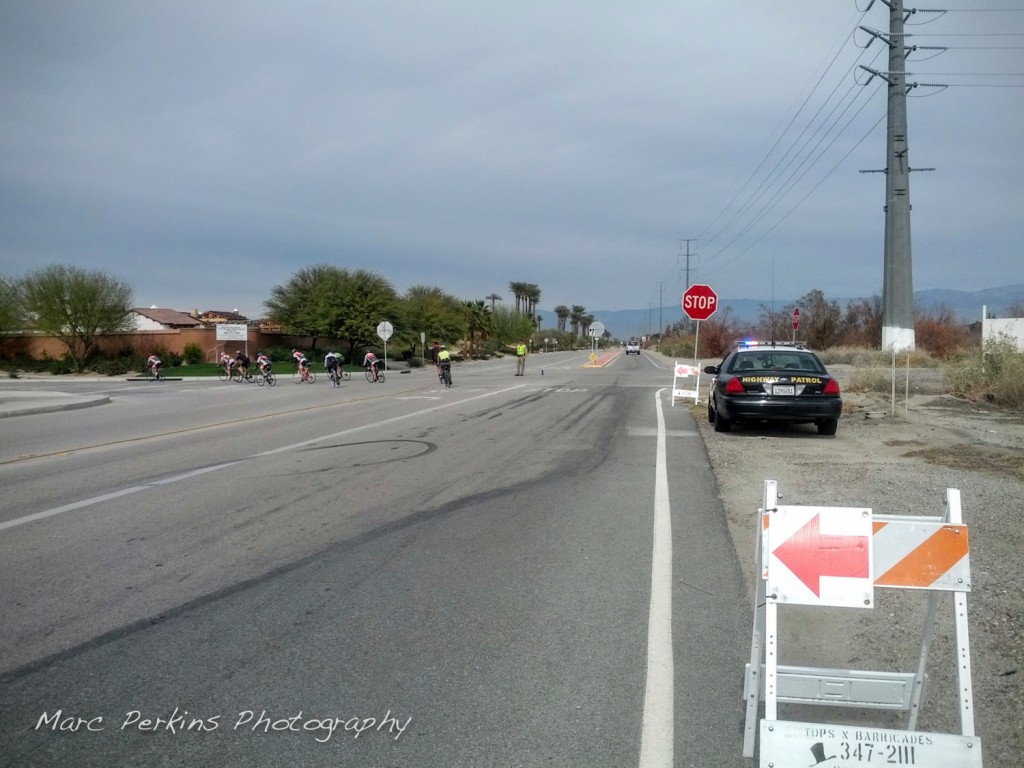 A California Highway Patrol officer directs traffic at an intersection for the Tour de Palm Springs. Thanks!
