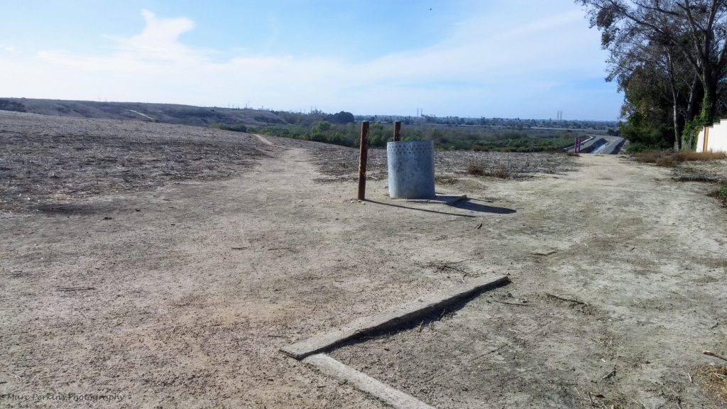 Dirt trails currently lead to destinations in Fairview Park. The off-street multi-use trail that runs on the northern edge of Fairview Park west of Placentia is visible in the distance.